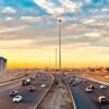 cars on road during sunset